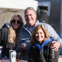 Dad, mom, and daughter at a table